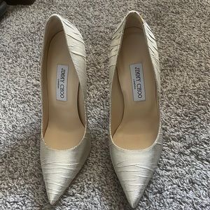 Metallic Lame Fabric Jimmy Choo pumps. Worn twice. Comes w box and dust bag.